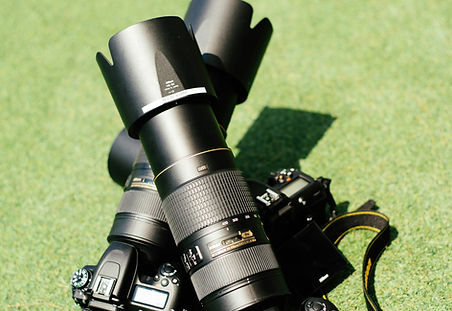 Professional sports photography equipment on a field
