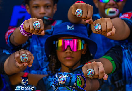 32 Sports players showing their championship rings